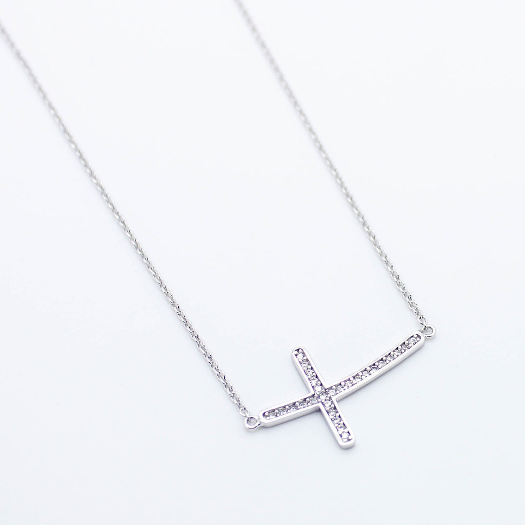 Curved cross sterling silver necklace