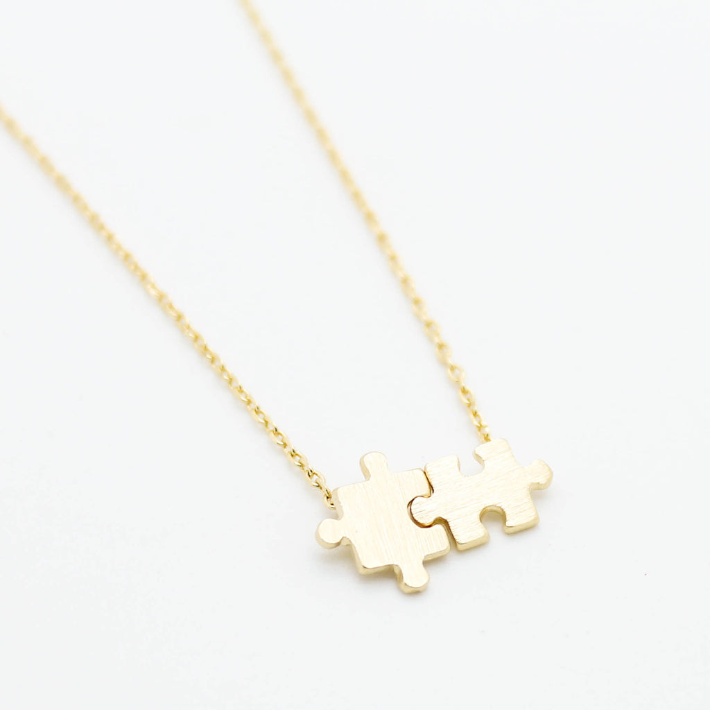 Puzzle pieces necklace