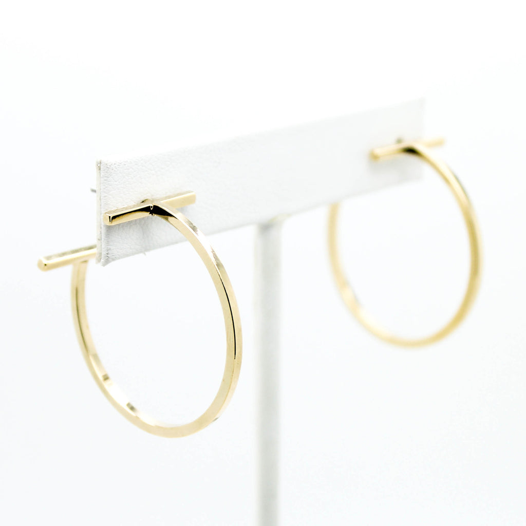 T hoop earrings