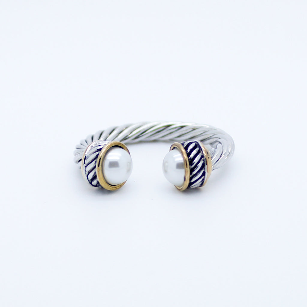 Delicate twisted band ring