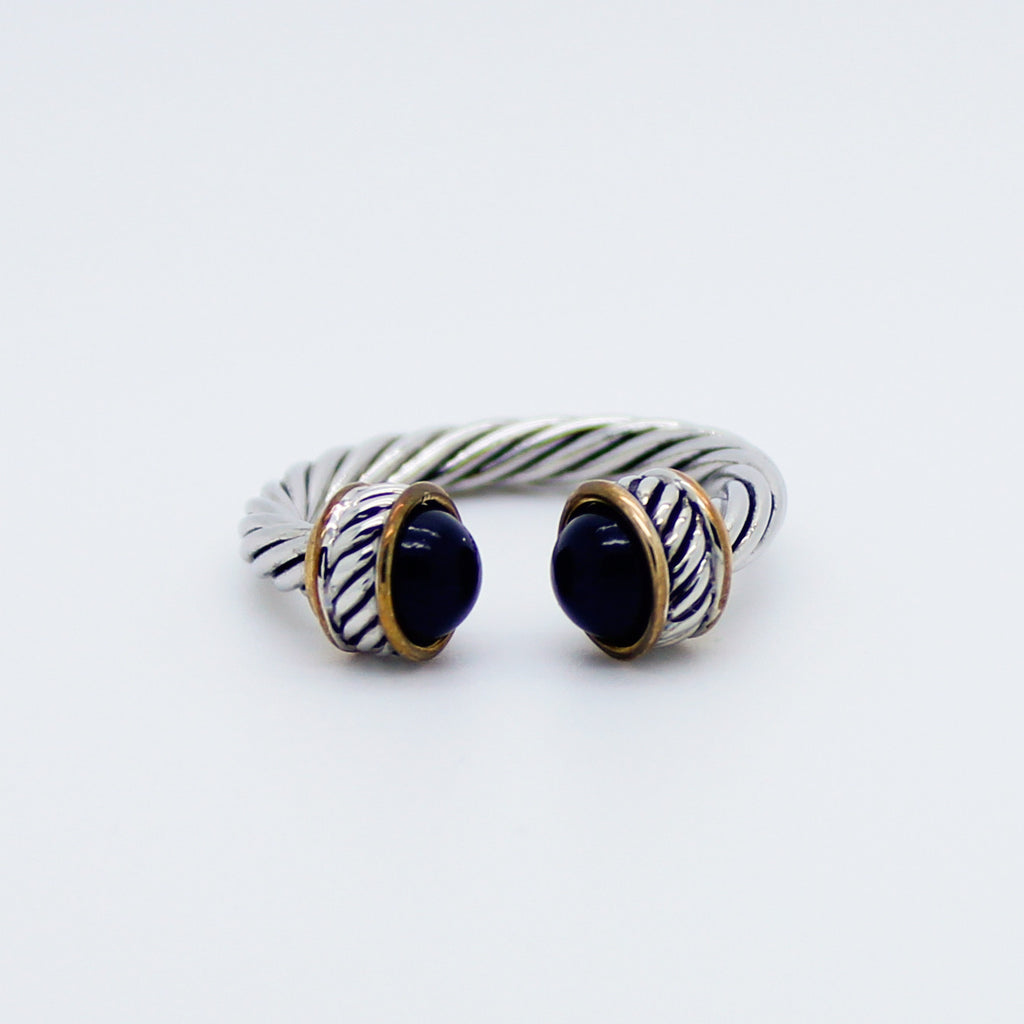 Delicate twisted band ring